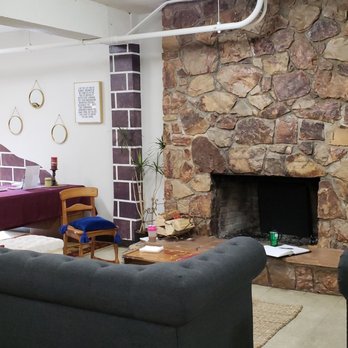 Collective Impact Center - Huddle around the fireplace - Shared Office Spaces Near Me - San Diego, California