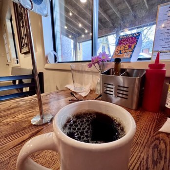 Open Oven - Table setting inside, by window looking out on front porch - Breakfast & Brunch Near Me - Black Mountain, North Carolina Open Oven - Table setting inside, by window looking out on front porch - Breakfast & Brunch Near Me - Black Mountain, North Carolina