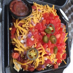 Goldies Express - Diana's invention: Nachos topped with freshly prepared chilli (beef & beans) & veggies served w sour cream & salsa