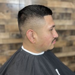 Mr Trims Barbershop - Taper fade by Brenda
