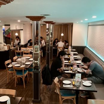 Nine Tastes - Dining area to other side of entry hallway - Thai Near Me - Cambridge, Massachusetts