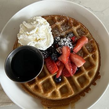 Molly's - Waffle with syrup, whipped cream and fresh fruit (blackberries and strawberries) - Breakfast & Brunch Near Me - San Diego, California Molly's - Waffle with syrup, whipped cream and fresh fruit (blackberries and strawberries) - Breakfast & Brunch Near Me - San Diego, California