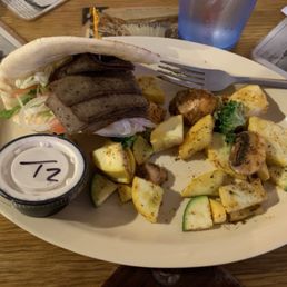 Gyro sandwich with mixed veggies.