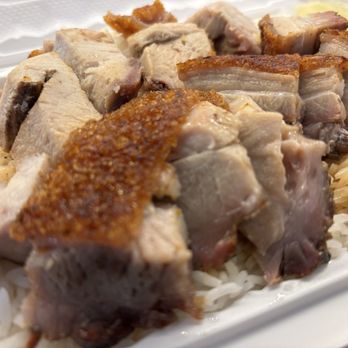 Golden Lake Pavilion - Roast pig close-up - Dim Sum Near Me - Flushing, New York Golden Lake Pavilion - Roast pig close-up - Dim Sum Near Me - Flushing, New York