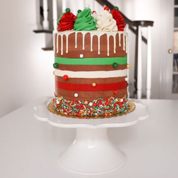 Luxe Cakes by Elina - a cake decorated with icing and sprinkles - Custom Cakes Near Me Luxe Cakes by Elina - a cake decorated with icing and sprinkles - Custom Cakes Near Me