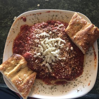 Italian Pizza Pub - Manicotti with homemade garlic bread..   The marinara sauce is homemade which takes 8 hrs to cook. - Italian Near Me - Johnson City, Tennessee