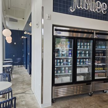 Ice Cream Jubilee - Seating area and ice cream fridge - Ice Cream & Frozen Yogurt Near Me - College Park, Maryland Ice Cream Jubilee - Seating area and ice cream fridge - Ice Cream & Frozen Yogurt Near Me - College Park, Maryland