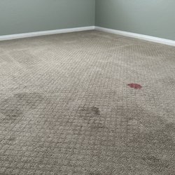 Superior Flooring and Upholstery Cleaning - Before - Red stain from kids slime toy + dark stains