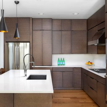 Schell Brothers - a modern kitchen with stainless steel appliances - General Contractors Near Me - Rehoboth Beach, Delaware