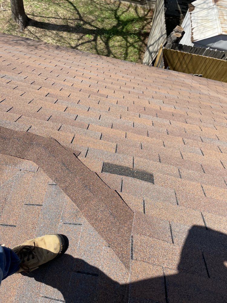 Slide of Restoration Roofing & Remodeling