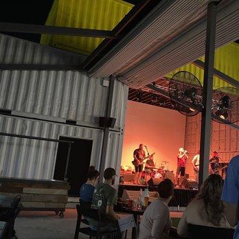 Fort Brewery & Pizza - A shot of the stage and the accordion roof - Italian Near Me - Fort Worth, Texas Fort Brewery & Pizza - A shot of the stage and the accordion roof - Italian Near Me - Fort Worth, Texas