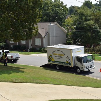 Steven's Wack-n-Sack - ows a delivery truck parked on a residential street - Lawn Services Near Me - Maylene, Alabama Steven's Wack-n-Sack - ows a delivery truck parked on a residential street - Lawn Services Near Me - Maylene, Alabama