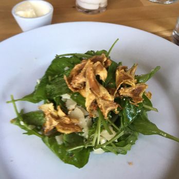 Sycamore - Half of the arugula salad with crispy artichoke (they split it on two plates for us to share) - New American Near Me - Newton, Massachusetts
