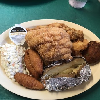 The Ark - The Seafood Platter: 1 Fried Catfish Filet, 2 Fried Frog Legs, 2 Fried Shrimp, 2 Fried Oysters, 1 Baked Potato, Coleslaw, & 3 Hushpuppies - Seafood Near Me - Riverside, Alabama
