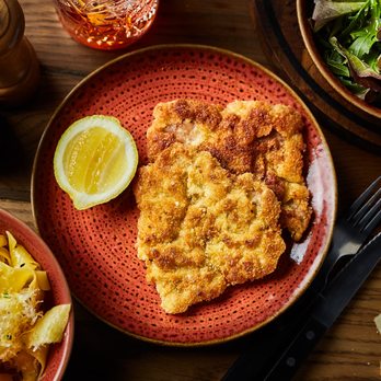 Alimento - Escalope de veau alla milanese. Veal chop, milanese style. - Pizza Near Me - Paris, 75