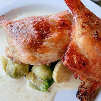 La Bonne Table - Duck confit with Brussels sprouts in a mustard cream sauce - French Near Me - San Diego, California