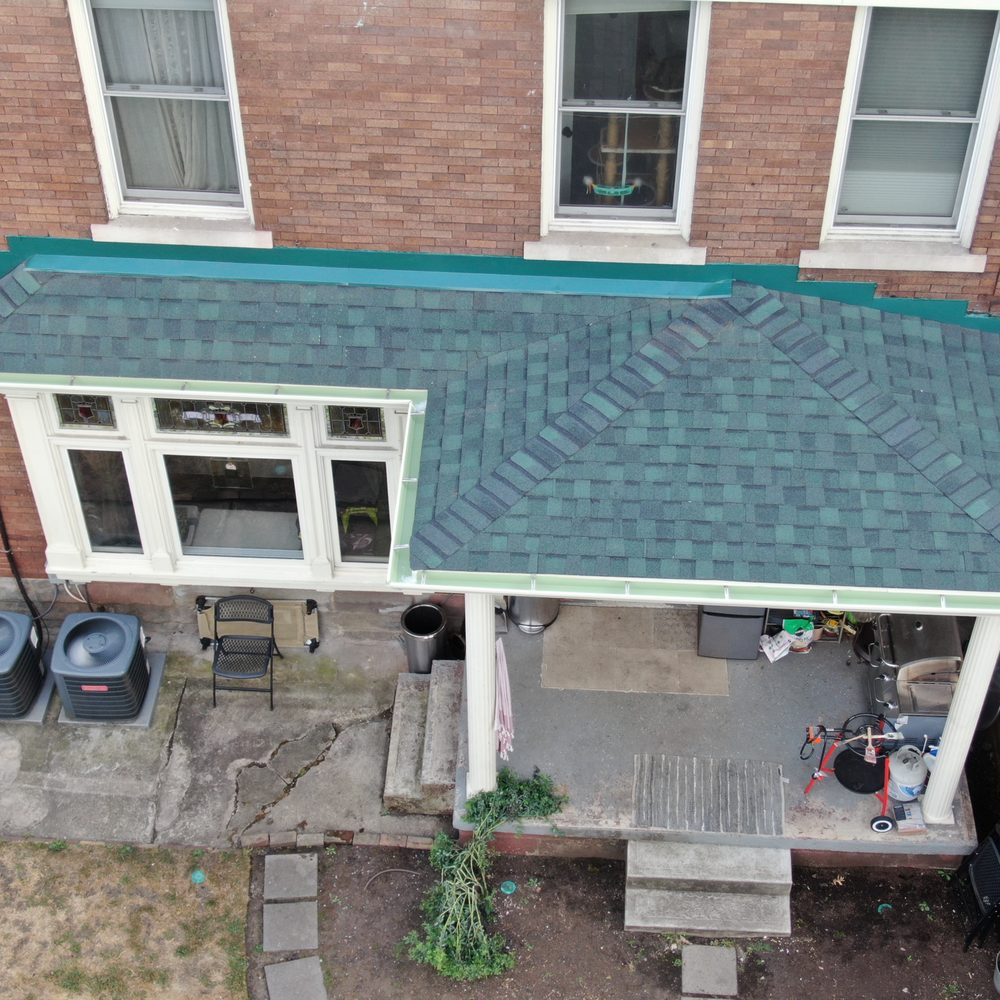 Pittsabana Roofing - Back porch: reframed, new shingles & flashing, and new seamless gutters - Roofing Near Me - Castle Shannon, Pennsylvania Pittsabana Roofing - Back porch: reframed, new shingles & flashing, and new seamless gutters - Roofing Near Me - Castle Shannon, Pennsylvania