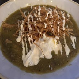 Smoked Pork with poached eggs & green verde sauce.