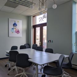 West Hartford Coworking - Our bright, spacious conference room has tables that roll for easy flexibility for any meeting setting or roll away for more space!