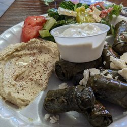 Caesars Mediterranean Grill - Dolmades platter which are grape leaves filled with rice, tomatoes, and herbs. It comes with pita bread, hummus. Choice of the side salad