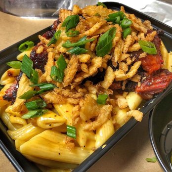 When Pigs Fly BBQ - Homemade Mac n cheese topped with burnt ends crispy onions and chives. The best. - Barbeque Near Me - Wichita, Kansas