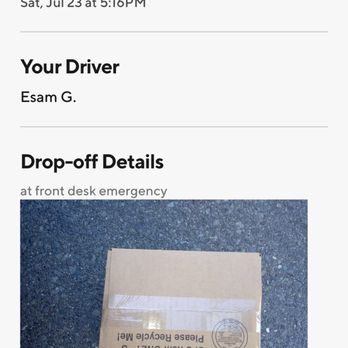 Gamestop - A cardboard package is positioned on a blue speckled floor, with a receipt from GameStop above it showing delivery details. The receipt indicates the store location in Pittsburg, CA, and the delivery was made at 5:16 PM. The package appears to be sealed with tape and is situated at the front desk emergency area of the store. - Videos & Video Game Rental Near Me - Pittsburg, California