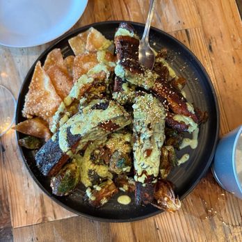 Elliot's Table - Ribs app with sprouts added - New American Near Me - Houston, Texas