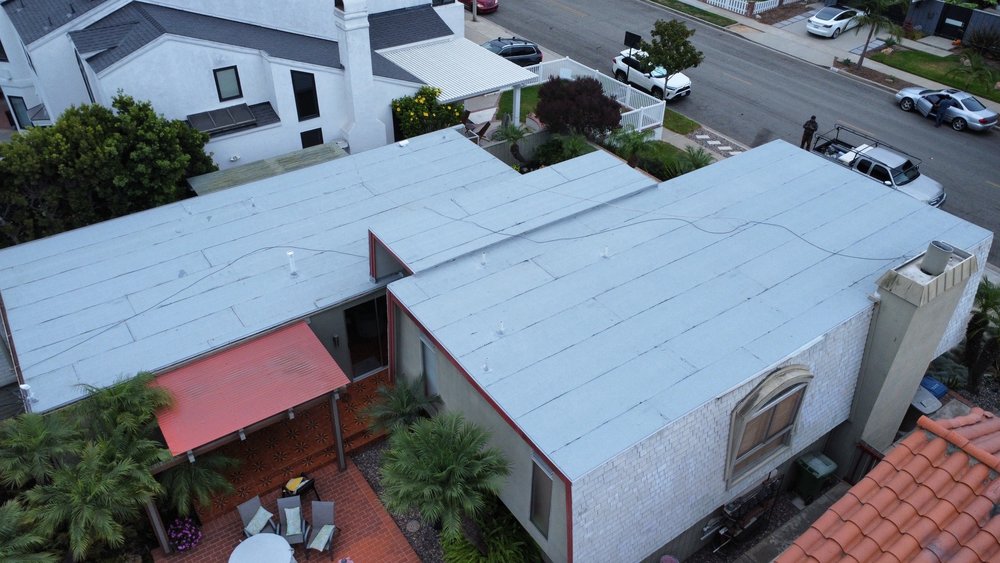 Slide of MMM Roofing