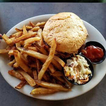 Train Wreck Bar - Smoked Pork sandwich with regular fries ( hard to tell but it was REALLY stuff with smoked pork) - Sports Bars Near Me - Burlington, Washington Train Wreck Bar - Smoked Pork sandwich with regular fries ( hard to tell but it was REALLY stuff with smoked pork) - Sports Bars Near Me - Burlington, Washington