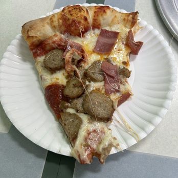 Napoli Pizza - Slice of meat lover pizza. - Pizza Near Me - Daytona Beach, Florida Napoli Pizza - Slice of meat lover pizza. - Pizza Near Me - Daytona Beach, Florida