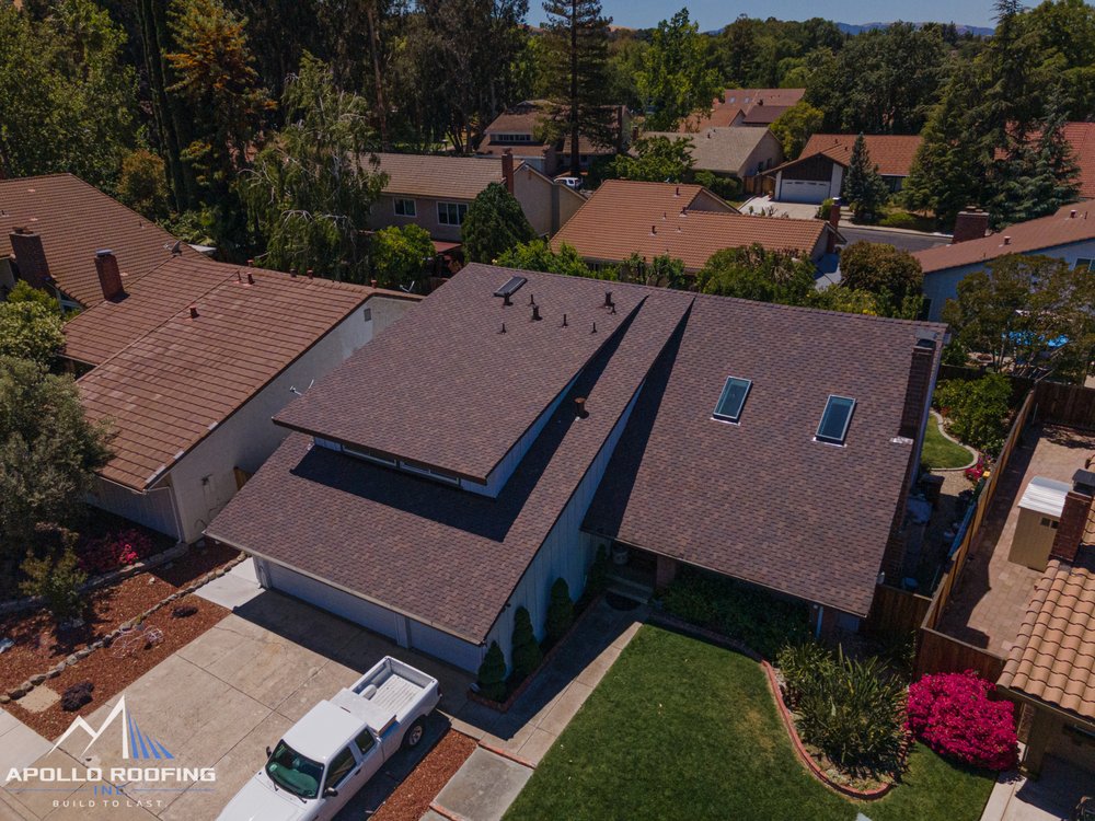 Slide of Apollo Roofing Company