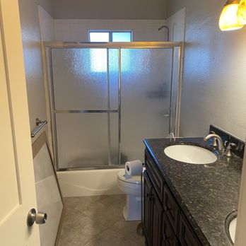 Perry Mason-ry - a bathroom with a shower, sink, and toilet - General Contractors Near Me - Anaheim, California Perry Mason-ry - a bathroom with a shower, sink, and toilet - General Contractors Near Me - Anaheim, California