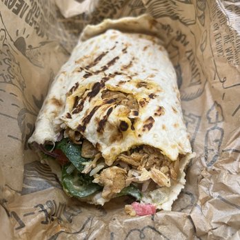 NAYA - a burrito wrapped in brown paper - Lebanese Near Me - Garden City, New York NAYA - a burrito wrapped in brown paper - Lebanese Near Me - Garden City, New York