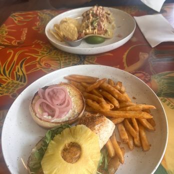 Cheeseburger In Paradise - Blackened mahi mahi sandwich and island fish tacos. - Burgers Near Me - Honolulu, Hawaii