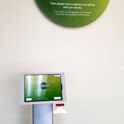 Quest Diagnostics - This is how you check in now. It scans your photo ID and insurance card(s). Then a real person comes out to get you.