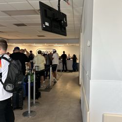 Payless Car Rental - The line of people that had to wait in 100 degree weather (no AC on) for hours