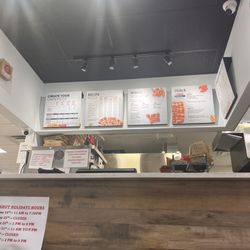 Pizza Hut - Waiting area / counter. It's wise to order in advance via the Pizza Hut app.
