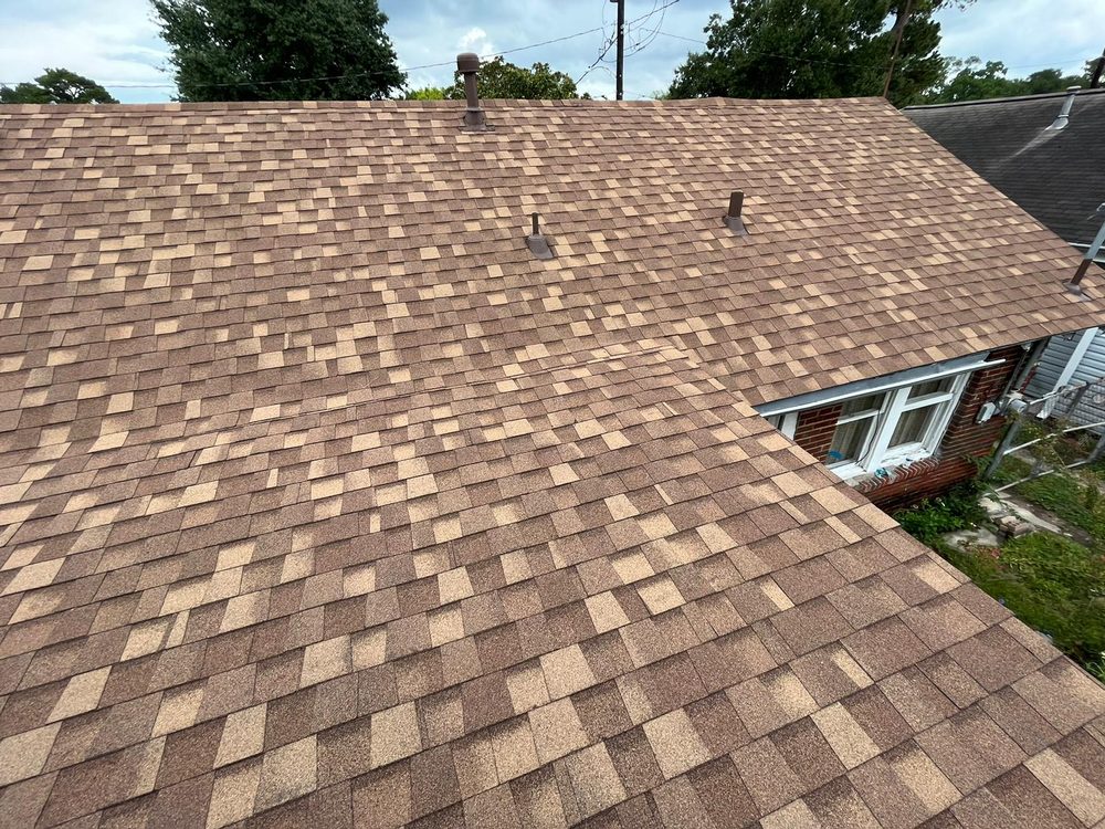 Slide of JUST ROOFING AND REMODELING