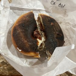 Ridge Country Deli - Lightly toasted with cream cheese and bacon...... . Keep on trying with this place ...... this will be the last time