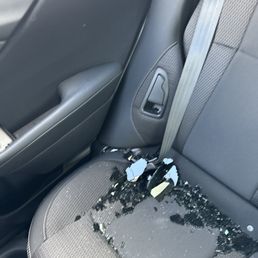 Broken glass from somebody who broke into my car Broken glass from somebody who broke into my car