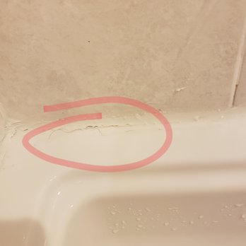 Handy Man Home Repair Expert - Even if he'd actually removed the grout & mold underneath, this isn't a good silicone job! - Drywall Installation & Repair Near Me - glendale, Arizona Handy Man Home Repair Expert - Even if he'd actually removed the grout & mold underneath, this isn't a good silicone job! - Drywall Installation & Repair Near Me - glendale, Arizona