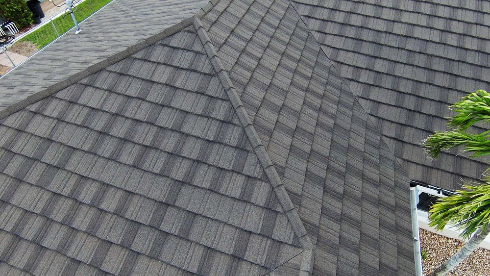 Slide of Four Peaks Roofing