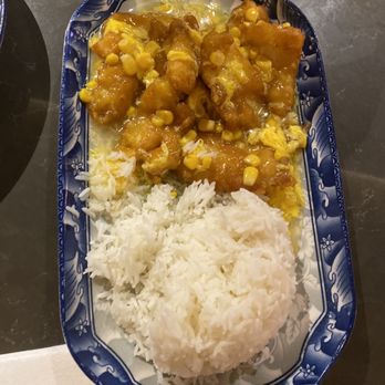 Dock 3366 - Fried fish filet over rice with cream corn sauce - Seafood Near Me - Queens, New York
