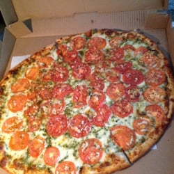 Pizzeria Davinci - Pesto: fresh pesto sauce topped with mozzarella cheese, fresh plum tomatoes, fresh garlic and spices
