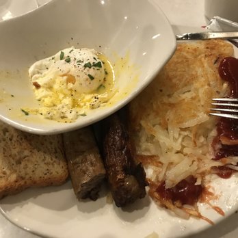 Matchbox Diner & Drinks - poached Matchbox breakfast with hash browns added - New American Near Me - Grand Rapids, Michigan