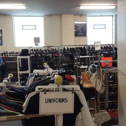 Uniforms, foreground.  Footwear, background.