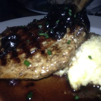 Memphis Cafe - Pork chop with polenta and cabbage - Southern Near Me - Costa Mesa, California Memphis Cafe - Pork chop with polenta and cabbage - Southern Near Me - Costa Mesa, California