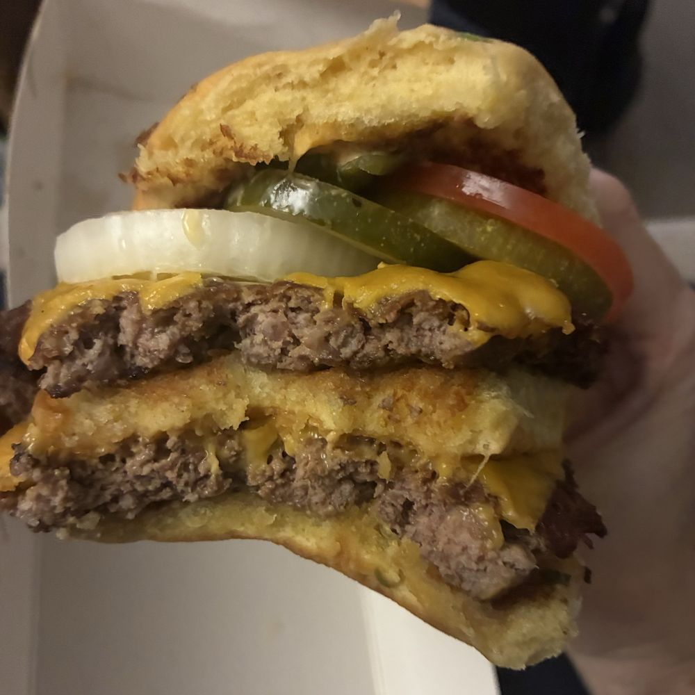 $13 the big shack. Love that it comes with pickles, onions, and tomato.