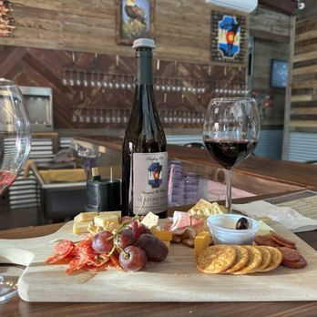 Bugling Elk Vineyards & Winery - Charcuterie board and a bottle of our favorite wine. Velvet Red Blend 2023. - Wineries Near Me - Penrose, Colorado Bugling Elk Vineyards & Winery - Charcuterie board and a bottle of our favorite wine. Velvet Red Blend 2023. - Wineries Near Me - Penrose, Colorado