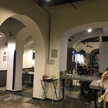 Comal - Interior view of architecture with social distancing tables. Clean and modern. - Mexican Near Me - Heroica Puebla de Zaragoza, PUE Comal - Interior view of architecture with social distancing tables. Clean and modern. - Mexican Near Me - Heroica Puebla de Zaragoza, PUE